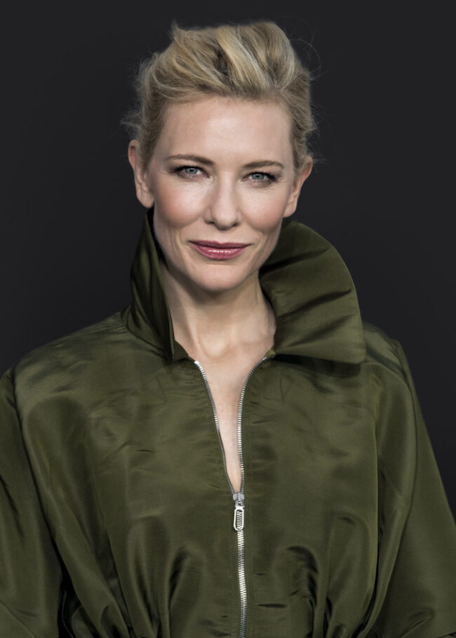 Cate Blanchett is an Australian actress known for her incredible range and versatility on stage and screen. Born on May 14, 1969, in Melbourne, Australia, Blanchett initially pursued a career in the theater before transitioning to film. She gained early recognition for her work in Australian films, such as Oscar and Lucinda and Paradise Road, before becoming a global superstar with her roles in films like Elizabeth, The Lord of the Rings, and The Aviator. Blanchett is known for her ability to inhabit complex and nuanced characters, and has received widespread critical acclaim for her work. She has won two Academy Awards, three Golden Globe Awards, and three BAFTA Awards, among numerous other accolades. In addition to her acting career, Blanchett is also involved in various humanitarian causes and has served as a UN Goodwill Ambassador since 2008. Blanchett is widely regarded as one of the greatest actresses of her generation, with a talent and range that have earned her a place among the most respected and influential performers in the entertainment industry.