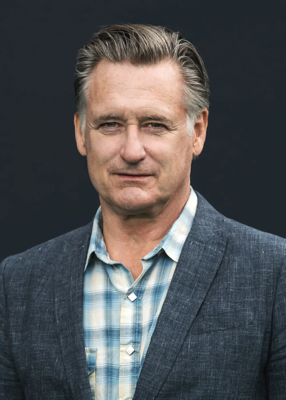 Bill Pullman is an American actor known for his work in film, television, and theater. Born on December 17, 1953, in Hornell, New York, Pullman began his career in the theater before making his way to Hollywood. Pullman has appeared in a wide range of films and television shows, including Spaceballs, Independence Day, While You Were Sleeping, and The Sinner, for which he received critical acclaim and a Primetime Emmy nomination. He has also appeared on Broadway in plays such as The Goat, or Who Is Sylvia? and Oleanna. With his talent, versatility, and dedication to his craft, Pullman has become a respected and influential figure in American entertainment, inspiring audiences with his performances both on stage and on screen.
