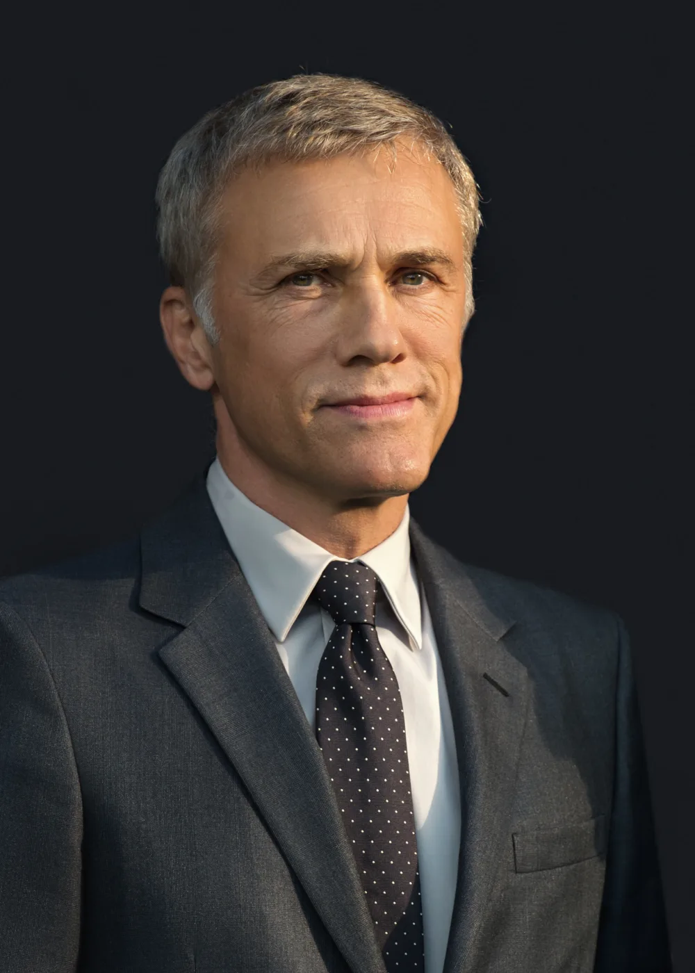 Christoph Waltz is an Austrian-German actor known for his exceptional talent and versatility on screen. Born on October 4, 1956, in Vienna, Austria, Waltz began his acting career in the late 1970s and quickly gained recognition for his work in German and Austrian film and television. He achieved international fame with his breakthrough role in Quentin Tarantino's Inglourious Basterds, for which he won the Academy Award for Best Supporting Actor. Waltz is known for his ability to convey complex emotions and inhabit a wide range of characters, from charming to menacing to comedic. He has received numerous awards and nominations for his work, including two Academy Awards, two Golden Globe Awards, and two BAFTA Awards. In addition to his acting career, Waltz is also a director and has worked in theater and opera. With his impressive talent and breadth of experience, Waltz has become one of the most respected and sought-after actors of his generation. He continues to captivate audiences with his dynamic performances on screen and stage.