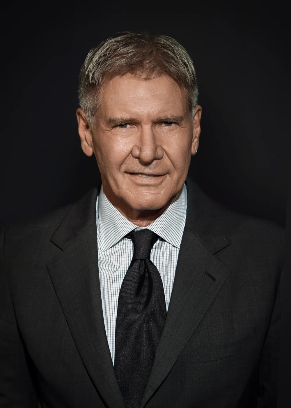 Harrison Ford is an American actor and film producer who has had an illustrious career in Hollywood spanning over five decades. Born on July 13, 1942, in Chicago, Illinois, Ford first gained fame for his iconic portrayal of Han Solo in the original Star Wars trilogy. He also played the lead role in the Indiana Jones film franchise. Ford is known for his ability to bring depth and nuance to every character he portrays, and has received numerous accolades throughout his career, including a Primetime Emmy Award and a Screen Actors Guild Award. He has also been nominated for an Academy Award, a BAFTA Award, and several Golden Globe Awards. In addition to his work in film, Ford is also an aviation enthusiast and an advocate for environmental causes. He is actively involved in conservation efforts and has served on the board of directors for several environmental organizations. With his talent, charisma, and commitment to social and environmental causes, Ford has become one of the most beloved and respected actors of his generation, known for his ability to captivate audiences with his powerful performances and his dedication to making the world a better place.