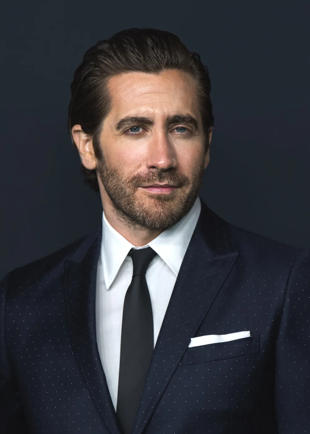 Jake Gyllenhaal is an American actor known for his dynamic range and intense performances. Born on December 19, 1980, in Los Angeles, California, Gyllenhaal grew up in a show business family and began acting in his early teens. He gained early recognition for his work in the cult classic Donnie Darko and has since gone on to star in a diverse array of films, from indie dramas like Brokeback Mountain and Nightcrawler to big-budget blockbusters like Spider-Man: Far From Home. Gyllenhaal is known for his transformative performances and his dedication to his craft. He has received numerous accolades for his work, including a Golden Globe Award and a BAFTA Award, and has been nominated for an Academy Award. In addition to his film work, Gyllenhaal has also worked in theater, receiving critical acclaim for his performances in Broadway productions of Constellations and Sunday in the Park with George. Gyllenhaal is also known for his philanthropic work, supporting various causes such as education, the environment, and LGBTQ rights. With his impressive talent and dedication to his craft, Gyllenhaal has become one of the most respected and sought-after actors of his generation.