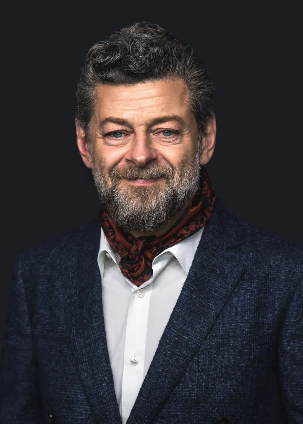 Jonathan Serkis is an English actor and filmmaker known for his groundbreaking motion capture performances in films such as The Lord of the Rings and The Hobbit trilogies. Born on April 20, 1964, in Ruislip, Middlesex, Serkis began his career as a stage actor before transitioning to film and television. Serkis is best known for his pioneering work in motion capture, which involves wearing a special suit and using sensors to track his movements and expressions. This technology allows filmmakers to create realistic and fully realized computer-generated characters, with Serkis bringing to life iconic roles such as Gollum in The Lord of the Rings and Caesar in the Planet of the Apes series. In addition to his acting work, Serkis has also established himself as a successful filmmaker, directing films such as Breathe and Mowgli: Legend of the Jungle. He is also known for his philanthropy and activism, supporting organizations such as the Motion Picture and Television Fund and the Enough Food for Everyone IF campaign. With his talent, creativity, and dedication to using technology to push the boundaries of storytelling, Serkis has become one of the most innovative and respected actors and filmmakers of his generation, inspiring fans around the world with his performances and his advocacy work.