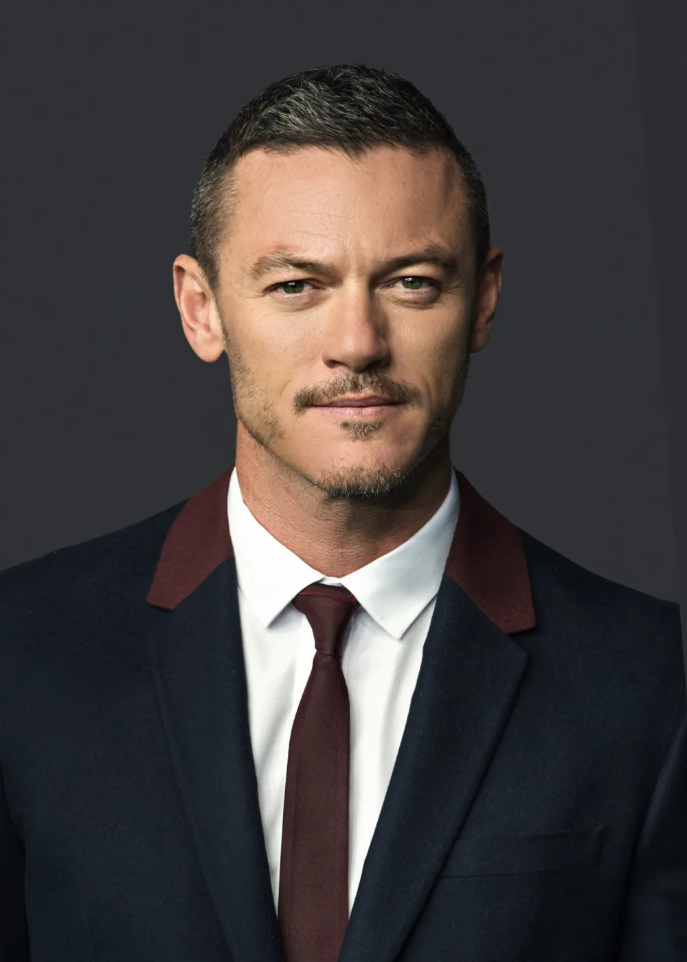 Luke Evans is a Welsh actor and singer known for his versatile performances in film, television, and theater. Born on April 15, 1979, in Aberbargoed, Wales, Evans began his career on stage before making his film debut in the 2010 remake of Clash of the Titans. Since then, Evans has gone on to star in a wide variety of film and television projects, earning critical acclaim for his performances in movies like The Girl on the Train, Beauty and the Beast, and Ma. He has also lent his vocal talents to several musical productions, including the film adaptation of Les Misérables. In addition to his acting work, Evans is known for his commitment to charitable causes, supporting organizations like the Teenage Cancer Trust and the Elton John AIDS Foundation. He has also been recognized for his work as an LGBTQ+ advocate, speaking out about the importance of representation and equality in the entertainment industry. With his talent, charisma, and dedication to making a difference in the world, Evans has become a respected and beloved figure in the entertainment industry, inspiring fans around the world with his performances and his advocacy work.